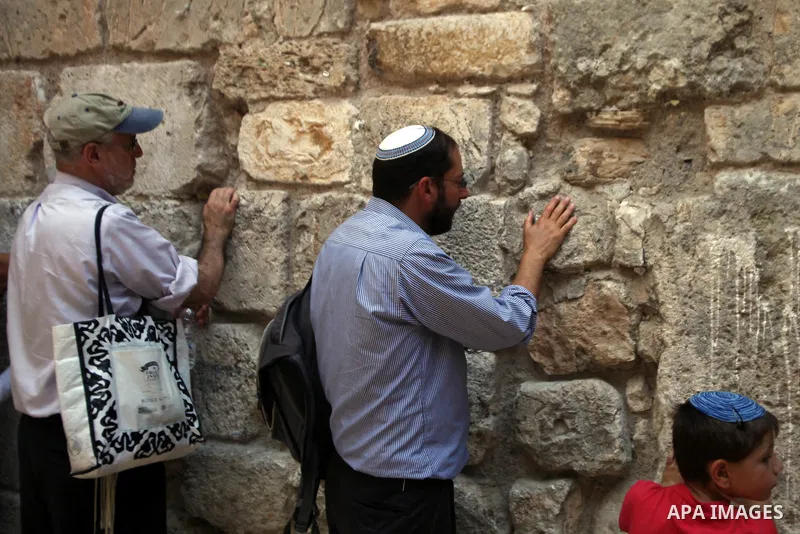Israeli ultra-Orthodox Jews pray at the Iron Gate Known as (Bab al-Hadid‎), in Jerusalem on August 3, 2014. Bab al-Hadid is located on the western side, near the Western Wall. Photo by Saeed Qaq