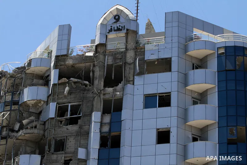 A general view shows the damage at the Tower El Zafer on August 3, 2014 in Gaza City after it was hit in an Israeli air strike. Renewed Israeli shelling killed at least 30 people in Gaza on Sunday after Prime Minister Be...