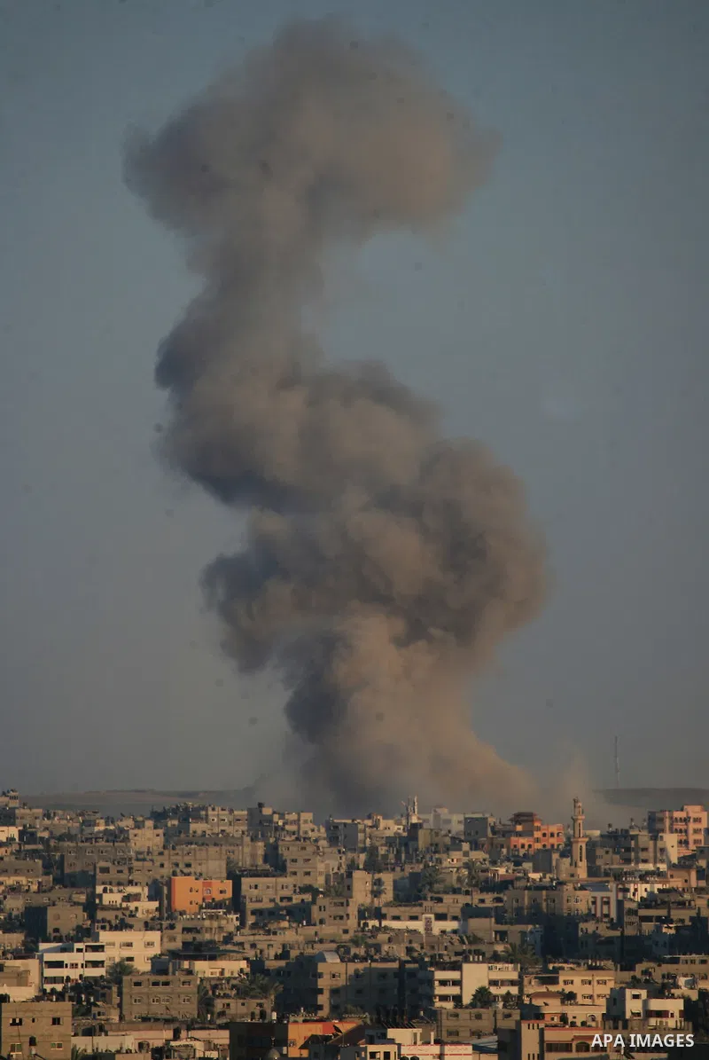 Smoke rises during an Israeli offensive in the east of Gaza City August 03, 2014. Israeli ground troops withdrew from the Gaza Strip, but airstrikes continued, killing at least 15 Palestinians. The Palestinian death toll...