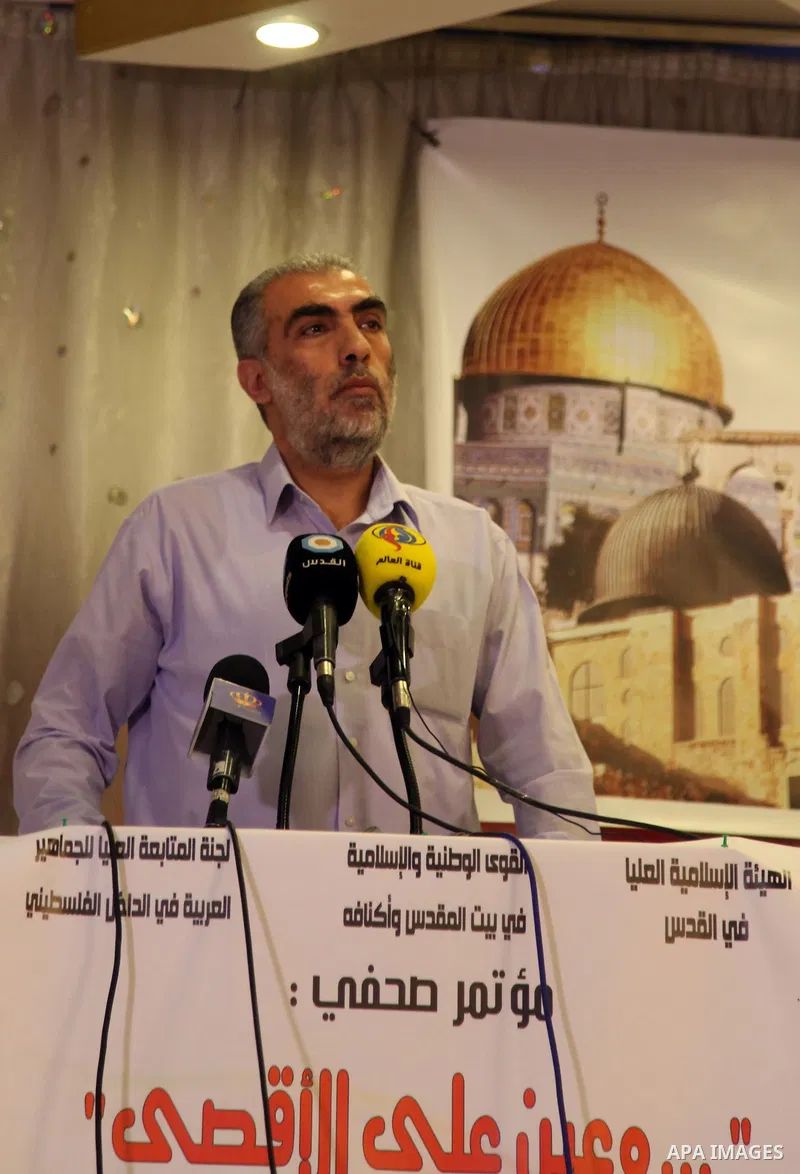 Deputy head of the Islamic Movement, Sheikh Kamal Khatib speaks during a a press conference to talk about latest violations in Al-Aqsa Mosque in Jerusalem, on August 4, 2014. Photo by Saeed Qaq