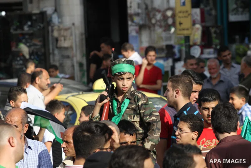 Palestinian Hamas supporters shout slogans against Israel during a protest to support Hamas and against the Israeli attack to Gaza strip in the West Bank city of Nablus, 04 August 2014. Israel will not end its offensive...