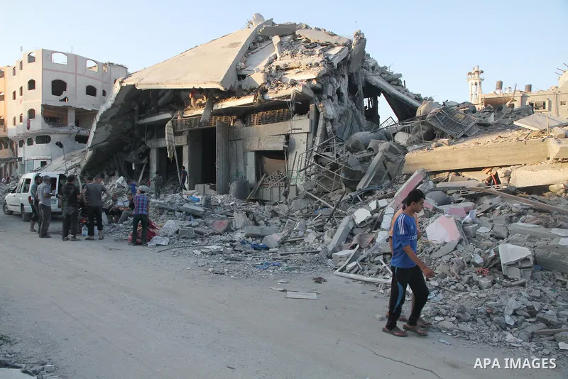 The ruins of destroyed houses are seen in the Shejaia neighbourhood, which witnesses said was heavily hit by Israeli shelling and air strikes during the Israeli offensive, in the east of Gaza City August 5, 2014. Israel...