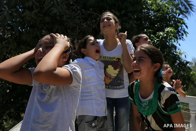 Palestinian relatives mourn the body of Palestinian of Al-Quds brigades, the military wing of Islamic Jihad, Shaban Al-Dahdouh, during his funeral in Gaza City, 06 August 2014. For the first time in nearly a month, the g...