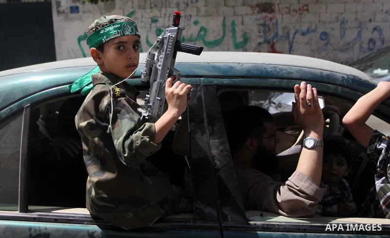 Palestinian protesters take part in a demonstration in support of the negotiator delegation in Cairo and the Palestinian resistance, in Gaza city on August 07, 2014. Indirect Israeli-Palestinian negotiations over extendi...