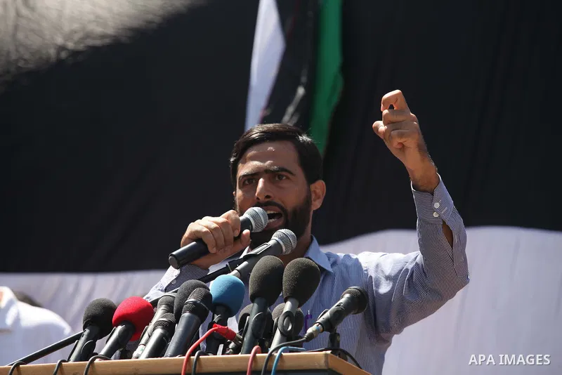 Palestinian Legislative Council member Mushir al-Masri, speaks during a demonstration in support of the negotiator delegation in Cairo and the Palestinian resistance, in Gaza city on August 07, 2014. Indirect Israeli-Pal...