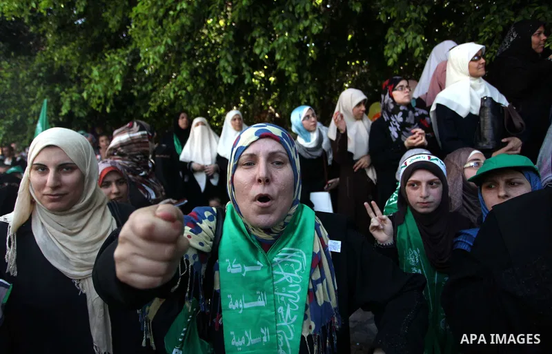 Palestinian protesters take part in a demonstration in support of the negotiator delegation in Cairo and the Palestinian resistance, in Gaza city on August 07, 2014. Indirect Israeli-Palestinian negotiations over extendi...