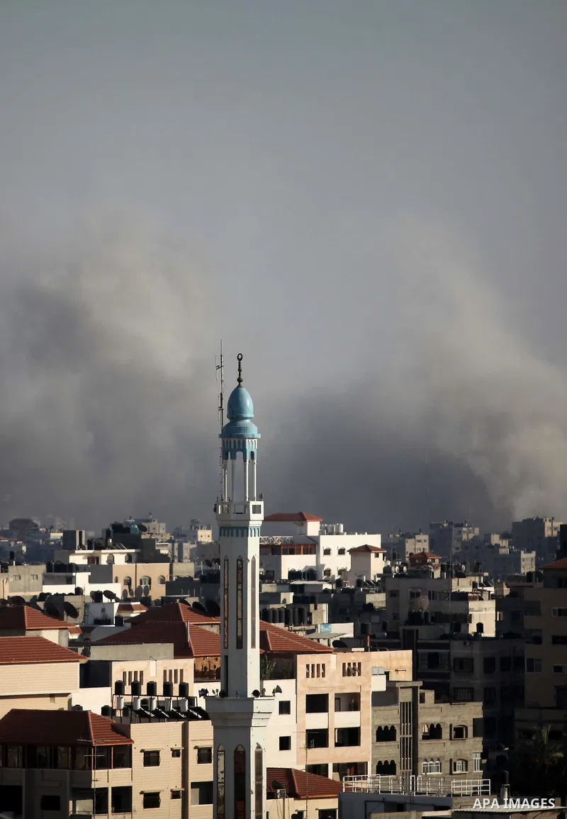 Smoke rises over Gaza City after an Israeli airstrike on Friday, August 08, 2014. Israel launched air strikes across the Gaza Strip on Friday in response to Palestinian rockets fired after Egyptian-mediated talks failed...