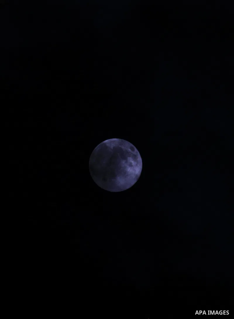 A perigee moon, also known as a super moon, raises over the Gaza city on August 10, 2014. Palestinian and Israeli negotiators on Sunday said they had accepted an Egyptian proposal for a new 72-hour truce with Israel, cle...