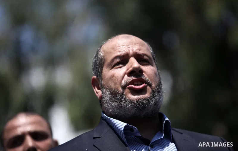Senior Hamas leader Khalil al-Hayya speaks to the media upon his return to Gaza City from truce talks in Cairo, in Gaza city on August 14, 2014. A renewed truce between Israel and Palestinians appeared to be holding on T...