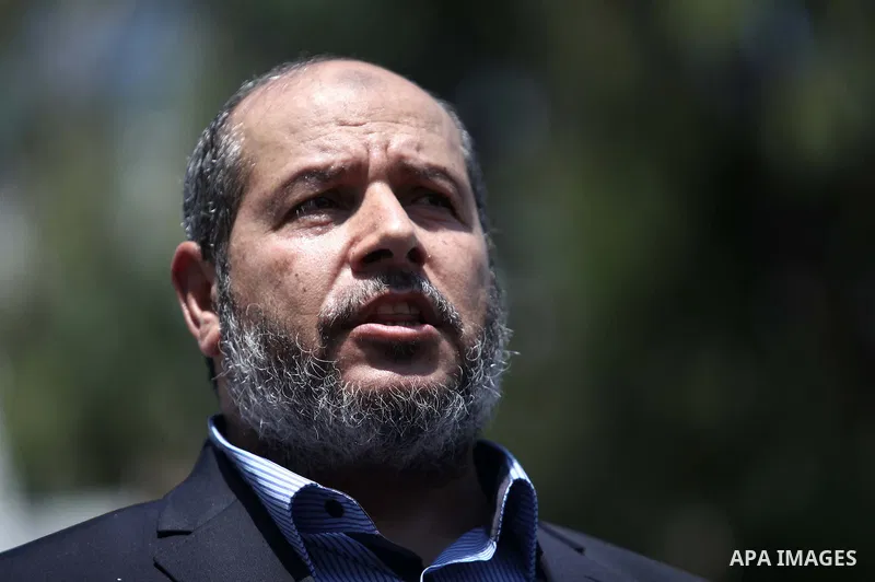Senior Hamas leader Khalil al-Hayya speaks to the media upon his return to Gaza City from truce talks in Cairo, in Gaza city on August 14, 2014. A renewed truce between Israel and Palestinians appeared to be holding on T...
