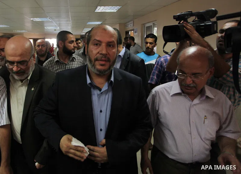 Senior Hamas leader Khalil al-Hayya visits Palestinians who were wounded during the Israeli offensive, upon his return to Gaza City from truce talks in Cairo, at al-Shifa hospital in Gaza city on August 14, 2014. A renew...