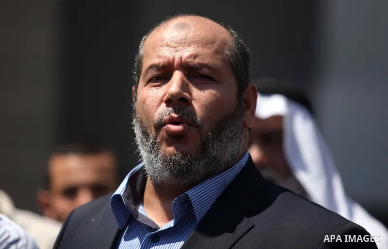 Senior Hamas leader Khalil al-Hayya speaks to the media upon his return to Gaza City from truce talks in Cairo, in Gaza city on August 14, 2014. A renewed truce between Israel and Palestinians appeared to be holding on T...