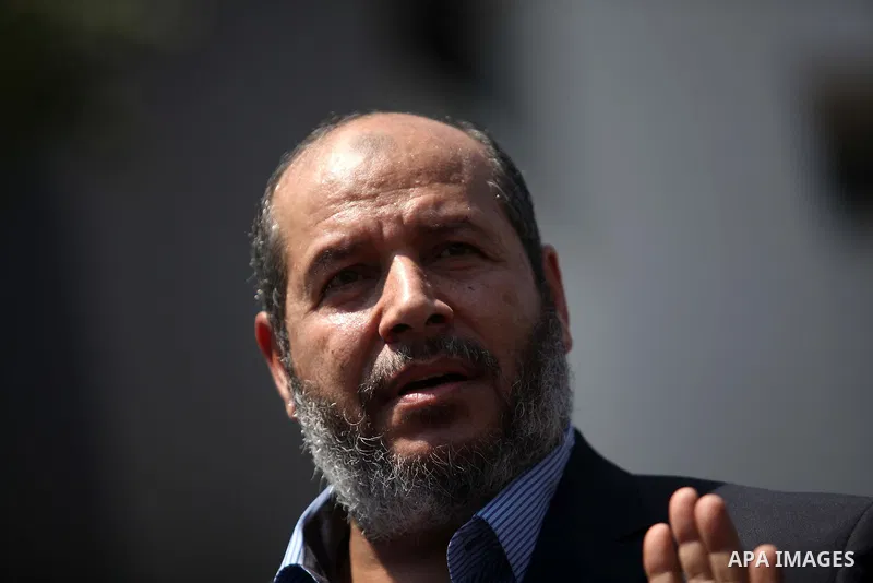Senior Hamas leader Khalil al-Hayya speaks to the media upon his return to Gaza City from truce talks in Cairo, in Gaza city on August 14, 2014. A renewed truce between Israel and Palestinians appeared to be holding on T...