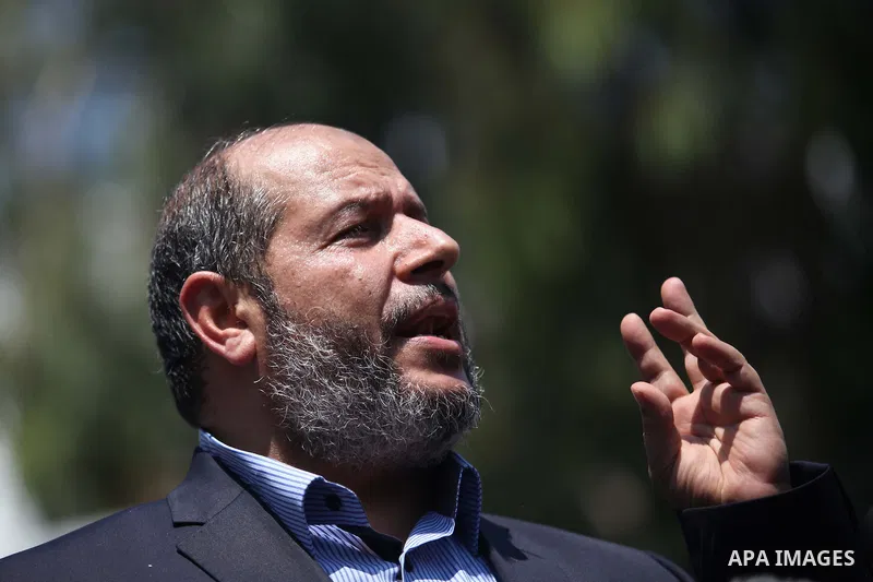 Senior Hamas leader Khalil al-Hayya speaks to the media upon his return to Gaza City from truce talks in Cairo, in Gaza city on August 14, 2014. A renewed truce between Israel and Palestinians appeared to be holding on T...