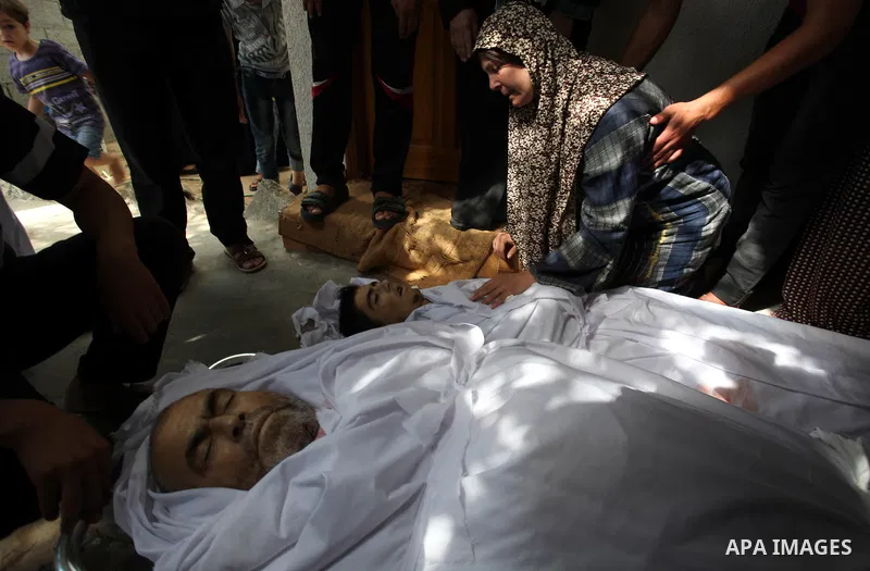 The Wife of Mosa Al-abadlah, who was killed in an Israeli air strike, mourns during their funeral in Khan Younis in the Southern Gaza strip. Since the collapse on Tuesday of a 10-day ceasefire, the Israeli military has r...