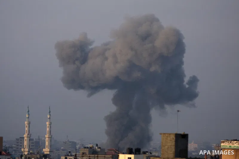 Smoke rises following an Israeli air strike in Gaza City on August 23, 2014. Hamas-led gunmen in Gaza executed 18 Palestinians accused of collaborating with Israel on Friday, accelerating a crackdown on suspected informe...
