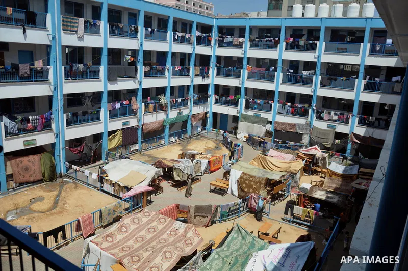 Palestinian displaced children sit at a UN school in Gaza City on August 24, 2014. The UN recently said that 460,000 Palestinians have been displaced by the violence which is more than a quarter of the population of the...