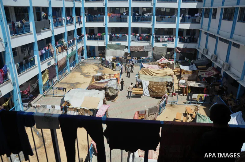 Palestinian displaced children sit at a UN school in Gaza City on August 24, 2014. The UN recently said that 460,000 Palestinians have been displaced by the violence which is more than a quarter of the population of the...