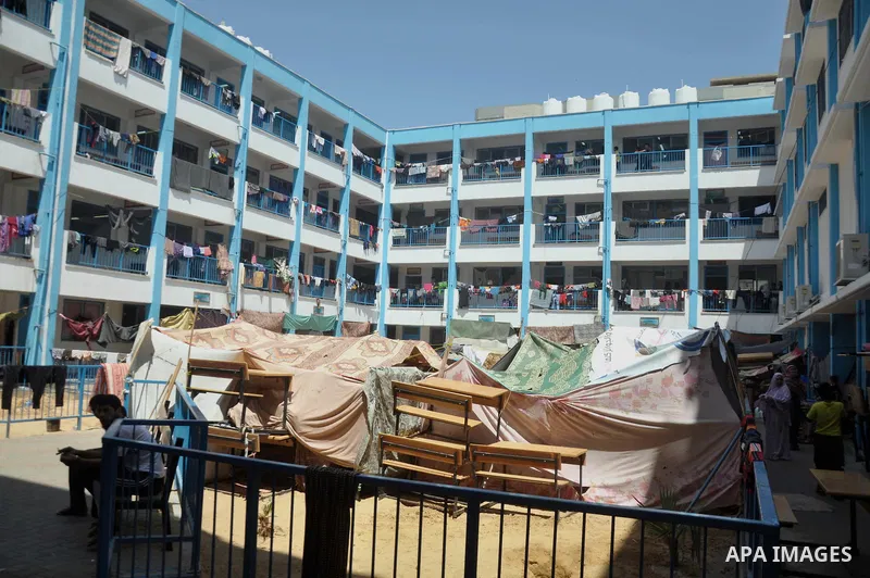 Palestinian displaced children sit at a UN school in Gaza City on August 24, 2014. The UN recently said that 460,000 Palestinians have been displaced by the violence which is more than a quarter of the population of the...