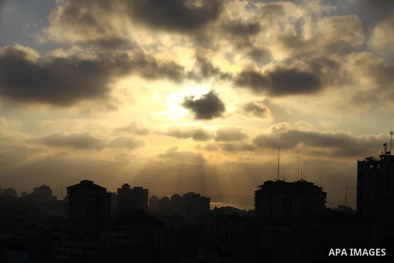 The sun sets over the Gaza strip, Monday, Aug. 25, 2014. Photo by Mohammed Othman