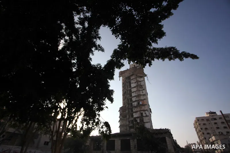 A general view of the remains of one of Gaza's tallest apartment towers, which witnesses said was hit by an Israeli air strike that destroyed much of it, in Gaza City August 26, 2014. Israeli air strikes launched before...