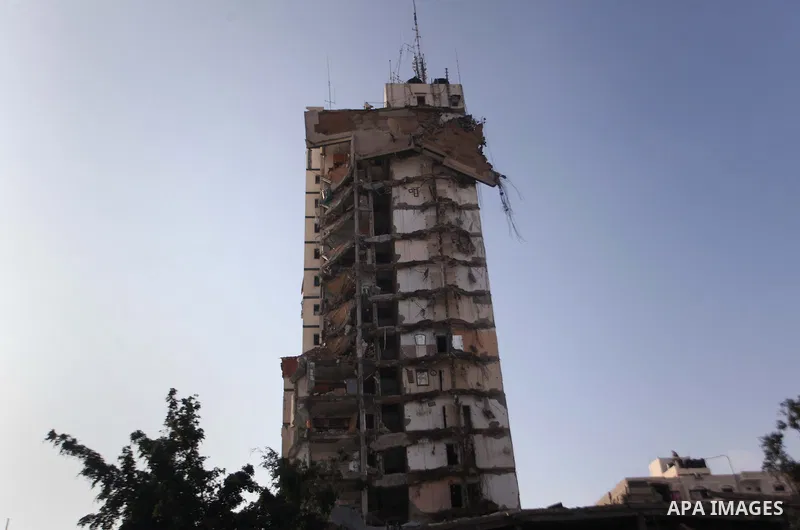 A general view of the remains of one of Gaza's tallest apartment towers, which witnesses said was hit by an Israeli air strike that destroyed much of it, in Gaza City August 26, 2014. Israeli air strikes launched before...