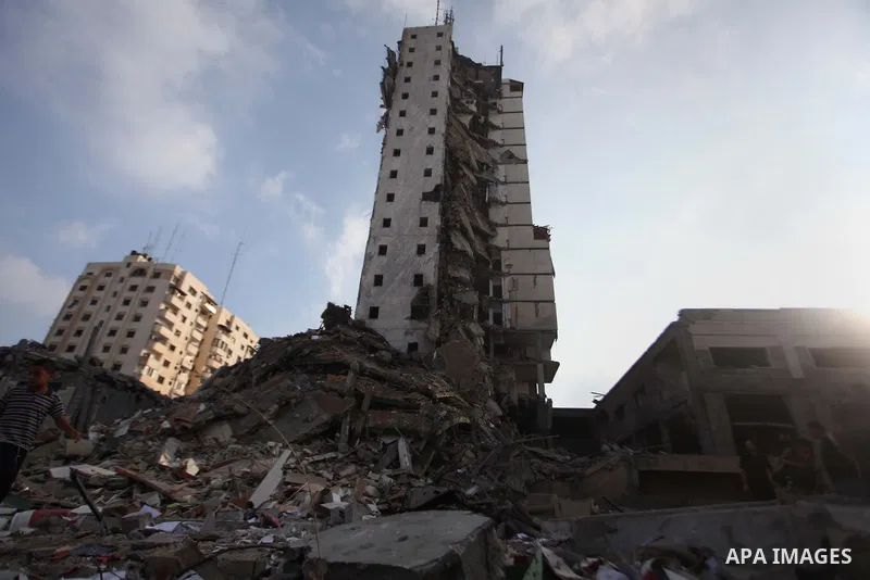 A general view of the remains of one of Gaza's tallest apartment towers, which witnesses said was hit by an Israeli air strike that destroyed much of it, in Gaza City August 26, 2014. Israeli air strikes launched before...