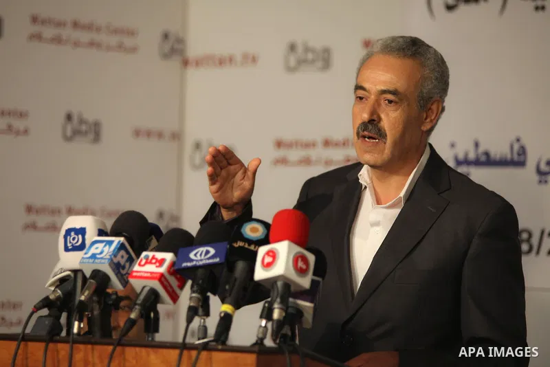 Palestinian director of the Center Mada for Media Freedom, Musa Rimawi speaks during a press conference about violations by Israeli and Palestinian to journalists, in the West Bank city of Ramallah, on Aug. 26, 2014. Pho...