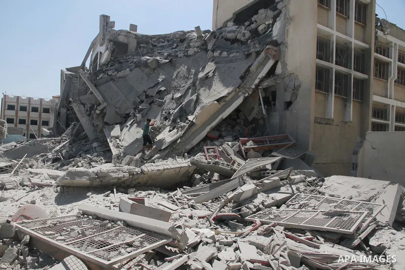 A general view of the rubble of a school, which witnesses said was hit by an Israeli air strike that destroyed much of it, in Gaza City August 26, 2014. Israeli air strikes launched before dawn on Tuesday killed two Pale...