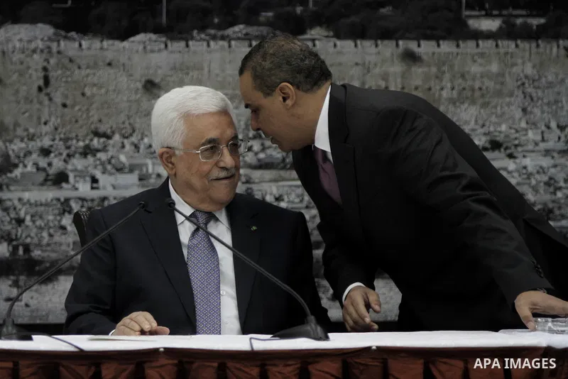 Palestinian President Mahmoud Abbas delivers a speech during a special leadership meeting in the West Bank city of Ramallah, 26 August 2014. Palestinian militant groups in the Gaza Strip and Israel have reached a deal to...