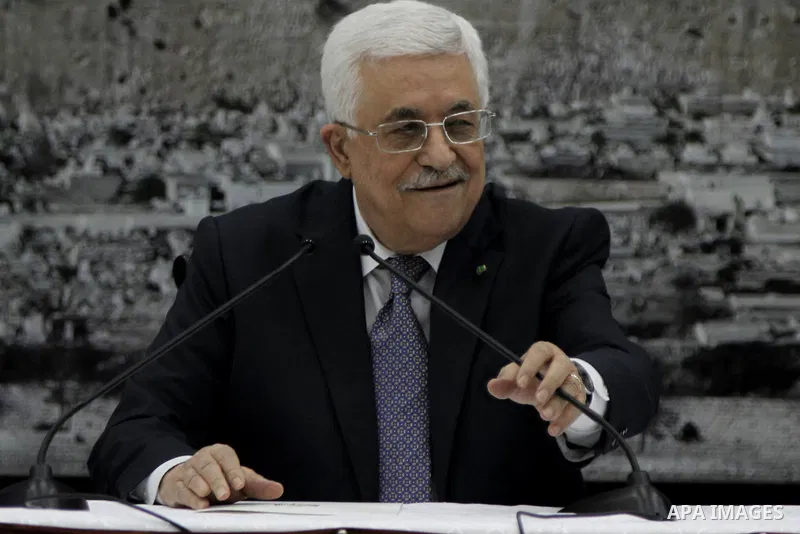 Palestinian President Mahmoud Abbas delivers a speech during a special leadership meeting in the West Bank city of Ramallah, 26 August 2014. Palestinian militant groups in the Gaza Strip and Israel have reached a deal to...