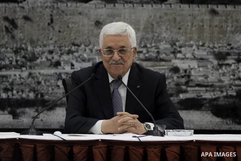 Palestinian President Mahmoud Abbas delivers a speech during a special leadership meeting in the West Bank city of Ramallah, 26 August 2014. Palestinian militant groups in the Gaza Strip and Israel have reached a deal to...