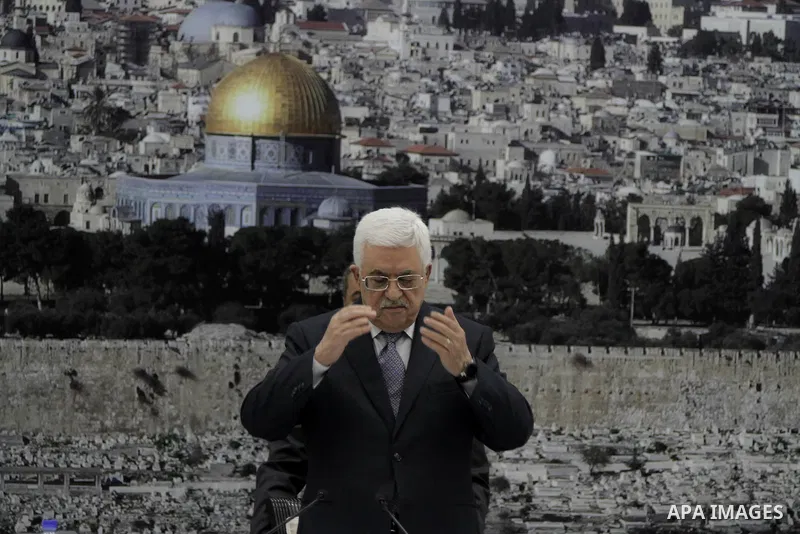 Palestinian President Mahmoud Abbas delivers a speech during a special leadership meeting in the West Bank city of Ramallah, 26 August 2014. Palestinian militant groups in the Gaza Strip and Israel have reached a deal to...