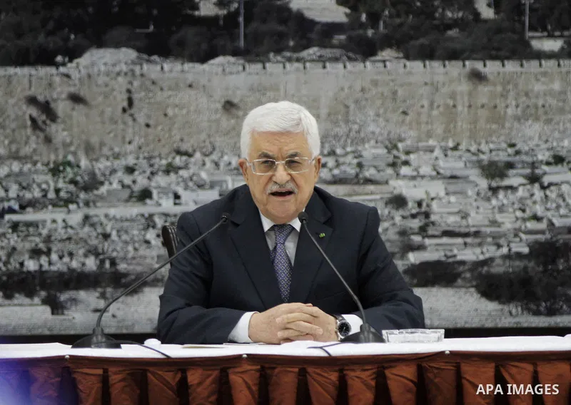 Palestinian President Mahmoud Abbas delivers a speech during a special leadership meeting in the West Bank city of Ramallah, 26 August 2014. Palestinian militant groups in the Gaza Strip and Israel have reached a deal to...