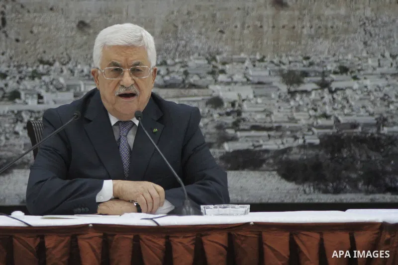 Palestinian President Mahmoud Abbas delivers a speech during a special leadership meeting in the West Bank city of Ramallah, 26 August 2014. Palestinian militant groups in the Gaza Strip and Israel have reached a deal to...