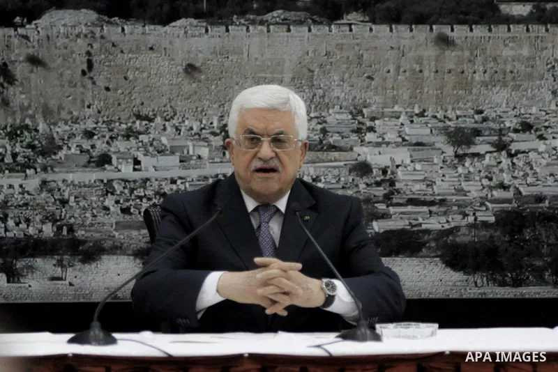 Palestinian President Mahmoud Abbas delivers a speech during a special leadership meeting in the West Bank city of Ramallah, 26 August 2014. Palestinian militant groups in the Gaza Strip and Israel have reached a deal to...