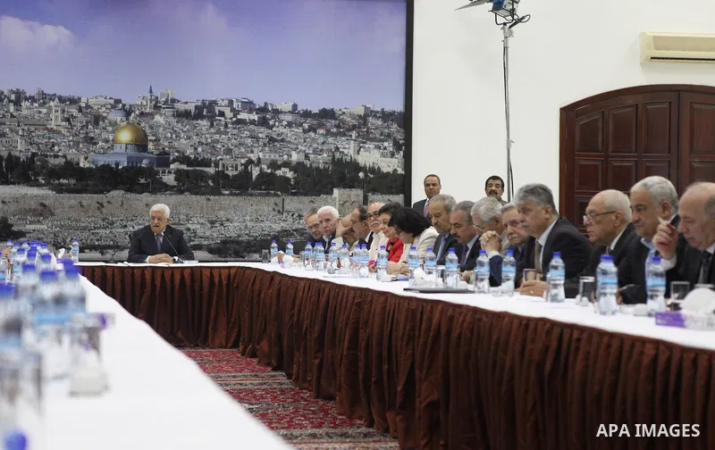 Palestinian President Mahmoud Abbas delivers a speech during a special leadership meeting in the West Bank city of Ramallah, 26 August 2014. Palestinian militant groups in the Gaza Strip and Israel have reached a deal to...