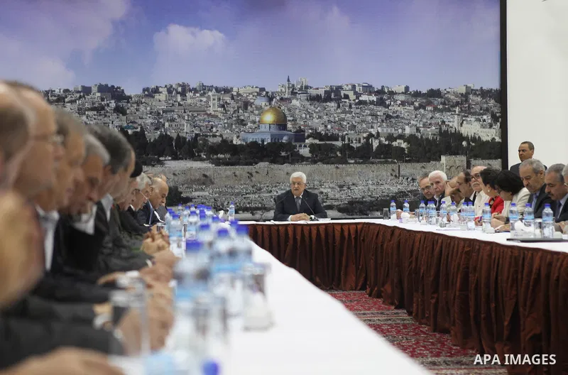 Palestinian President Mahmoud Abbas delivers a speech during a special leadership meeting in the West Bank city of Ramallah, 26 August 2014. Palestinian militant groups in the Gaza Strip and Israel have reached a deal to...