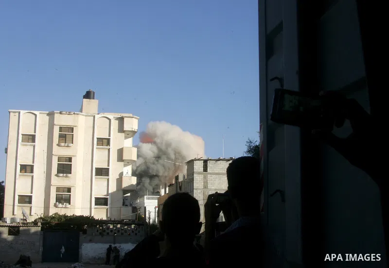 Smoke rises following what witnesses said was an Israeli air strike that targeted the house of Palestinian senior Islamic Jihad leader Nafez Azzam in Rafah, in the southern Gaza Strip August 26, 2014. A Gaza ceasefire be...