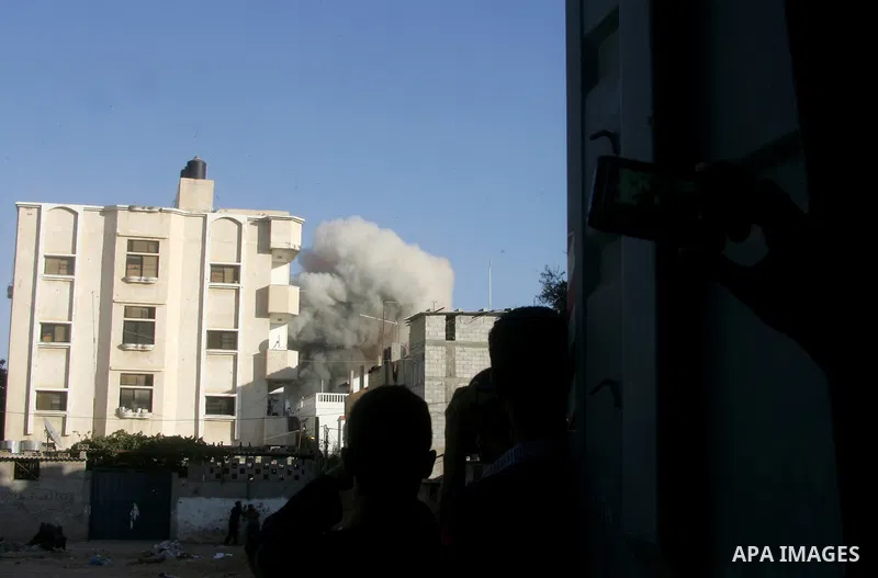Smoke rises following what witnesses said was an Israeli air strike that targeted the house of Palestinian senior Islamic Jihad leader Nafez Azzam in Rafah, in the southern Gaza Strip August 26, 2014. A Gaza ceasefire be...