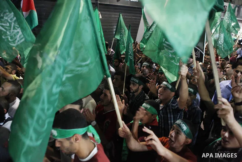 Palestinians celebrate what they said was a victory by Palestinians in Gaza over Israel following a ceasefire, in the West Bank city of Ramallah August 26, 2014. A ceasefire agreement between Israel and the Palestinians...