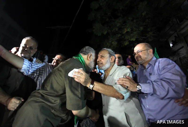 Senior Hamas leader Mahmoud Al-Zahar, appearing for the first time since the start of a seven-week conflict, speaks during a rally by Palestinians celebrating what they said was a victory over Israel, following a ceasefi...