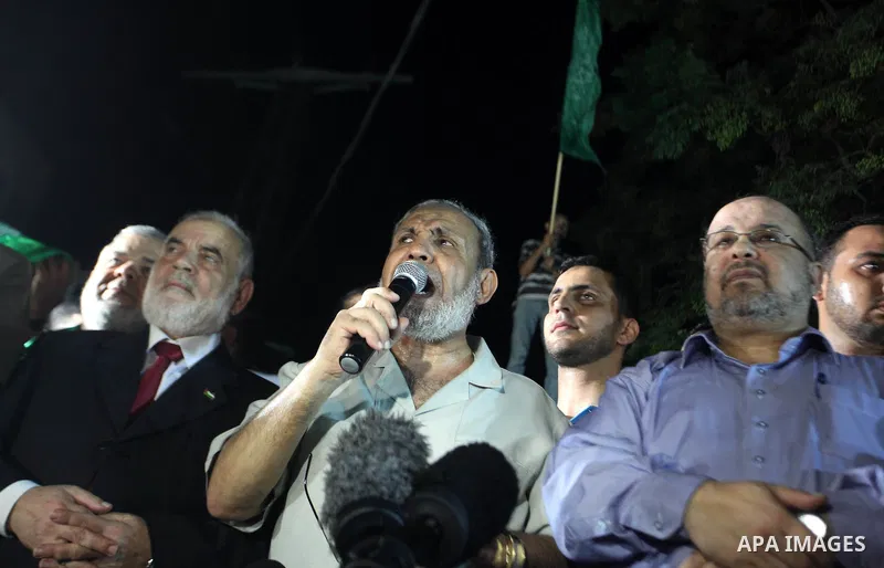 Senior Hamas leader Mahmoud Al-Zahar, appearing for the first time since the start of a seven-week conflict, speaks during a rally by Palestinians celebrating what they said was a victory over Israel, following a ceasefi...