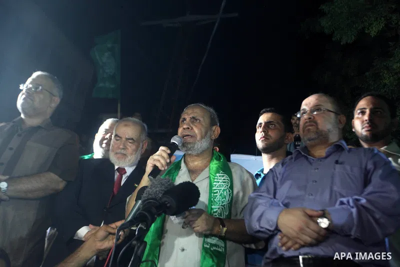Senior Hamas leader Mahmoud Al-Zahar, appearing for the first time since the start of a seven-week conflict, speaks during a rally by Palestinians celebrating what they said was a victory over Israel, following a ceasefi...
