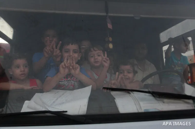 Palestinians gather in the streets celebrating a ceasefire in Gaza City, 26 August 2014. Palestinian President Mahmoud Abbas announced on 26 August 2014 an Egyptian-brokered ceasefire proposal to end seven weeks of fight...