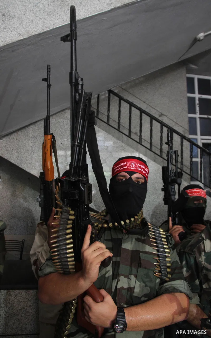 Palestinian Militants from the Democratic Front for the Liberation of Palestine (DFLP) attend a press conference in Gaza city on August 27, 2014. Palestinian President Mahmoud Abbas announced on 26 August 2014 an Egyptia...