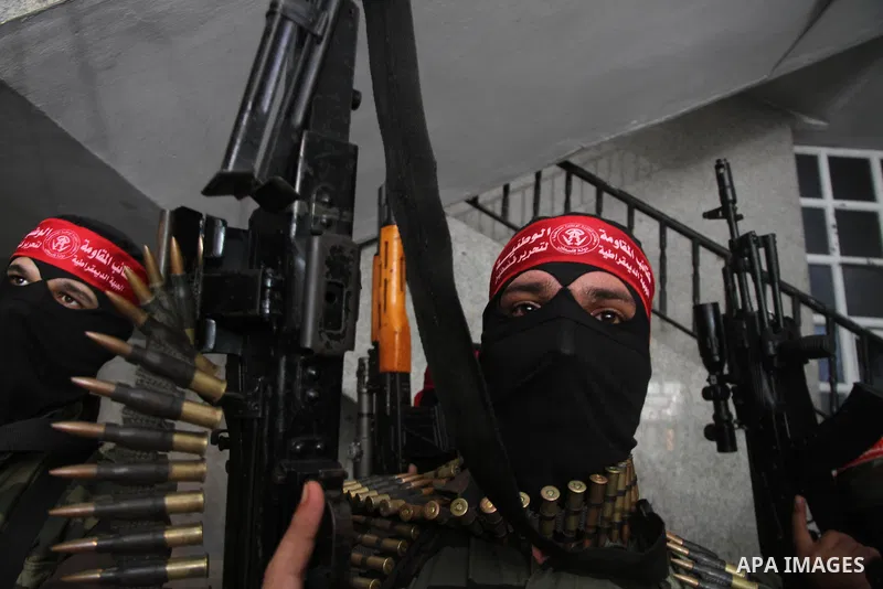 Palestinian Militants from the Democratic Front for the Liberation of Palestine (DFLP) attend a press conference in Gaza city on August 27, 2014. Palestinian President Mahmoud Abbas announced on 26 August 2014 an Egyptia...