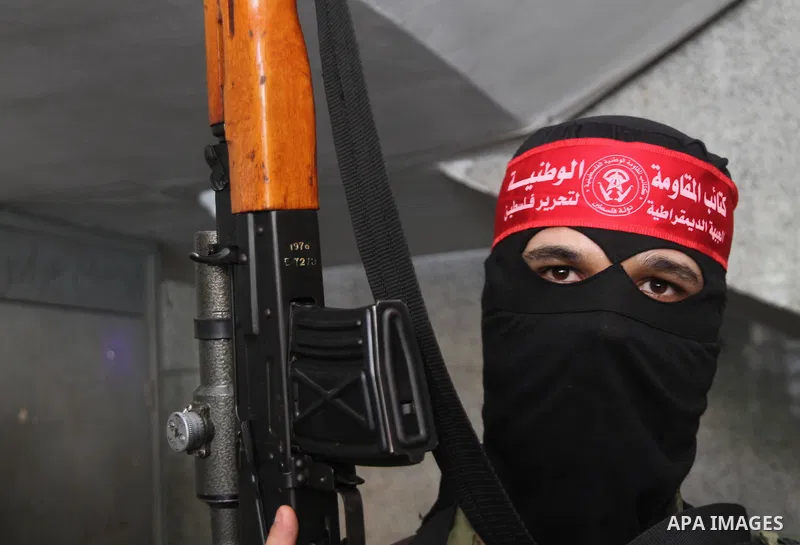 Palestinian Militants from the Democratic Front for the Liberation of Palestine (DFLP) attend a press conference in Gaza city on August 27, 2014. Palestinian President Mahmoud Abbas announced on 26 August 2014 an Egyptia...