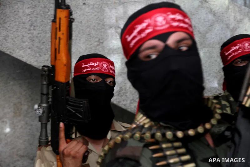 Palestinian Militants from the Democratic Front for the Liberation of Palestine (DFLP) attend a press conference in Gaza city on August 27, 2014. Palestinian President Mahmoud Abbas announced on 26 August 2014 an Egyptia...