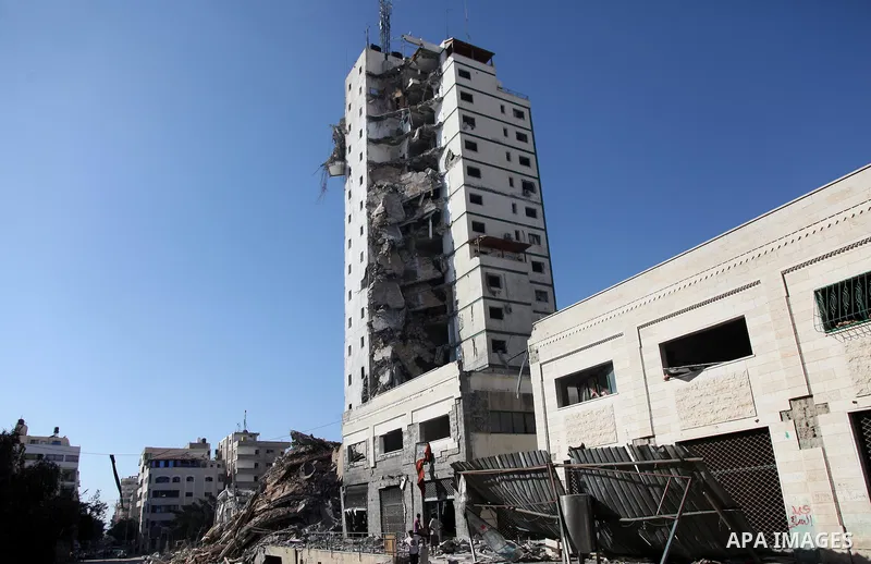A general view of the remains of one of Gaza's tallest apartment towers, which witnesses said was hit by an Israeli air strike that destroyed much of it, in Gaza City August 27, 2014. The open-ended ceasefire in the Gaza...